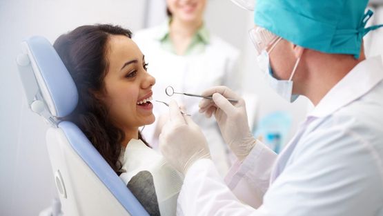 image of dentist and patient